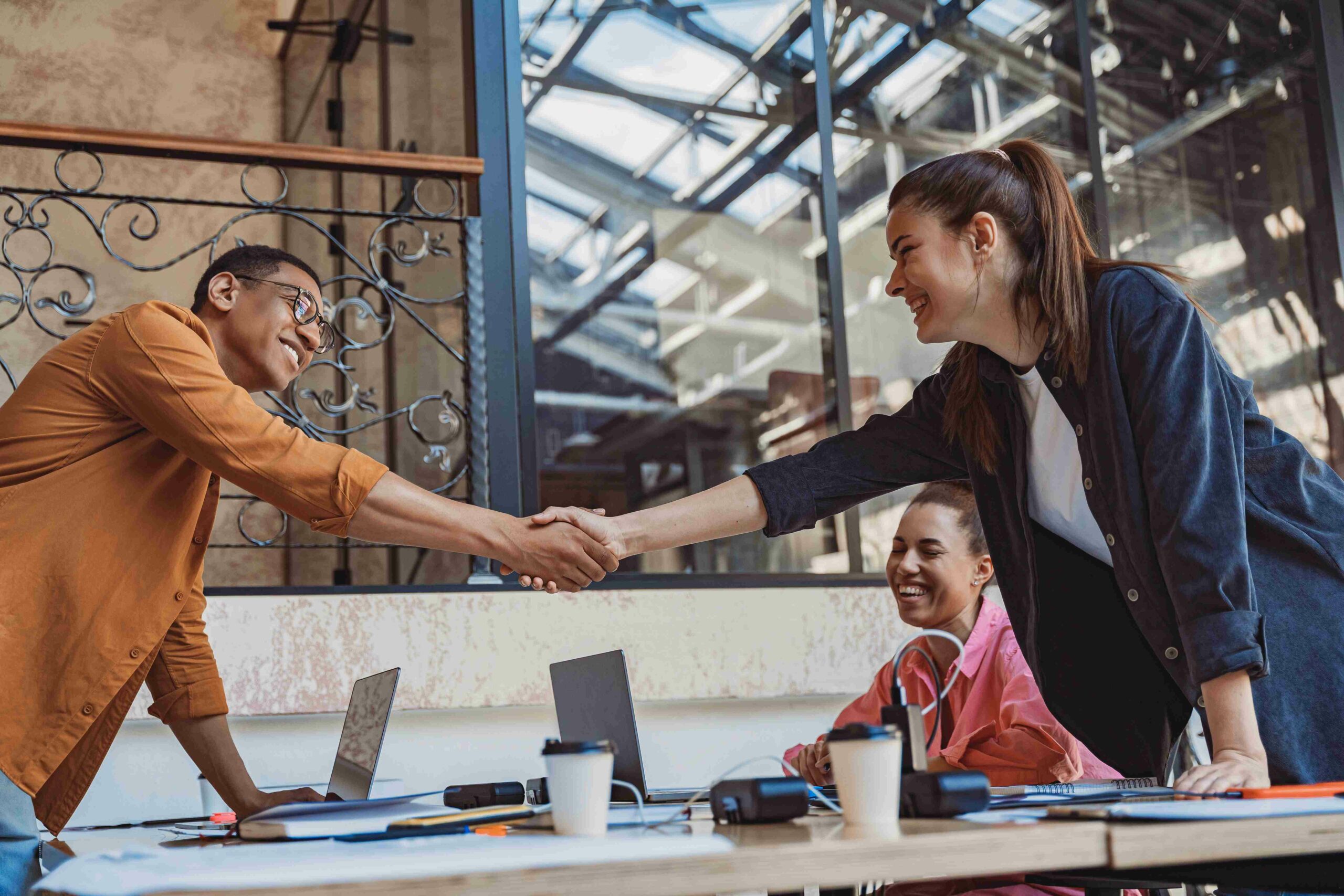 close-up-of-two-professional-business-people-shaki-2025-03-14-16-04-04-utc_11zon